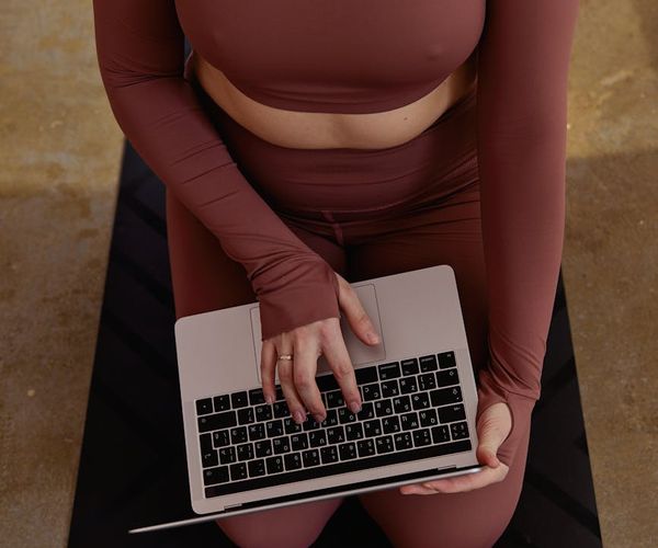 A calendar and a yoga mat, symbolizing the integration of exercise into daily life.